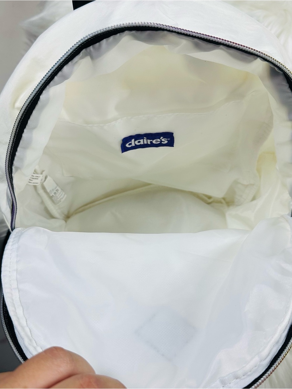 Claire's White Backpack with Black Trim and Multicolor Zipper - Picture 3 of 6